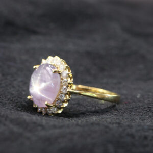 Purple Star Sapphire and Diamond Halo Ring